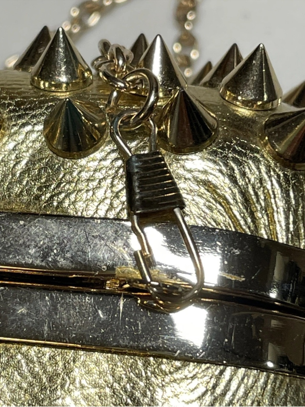 Edgy style Gold Spike Evening Clutch/ crossbody bag with skull knuckle handle - Picture 12 of 13